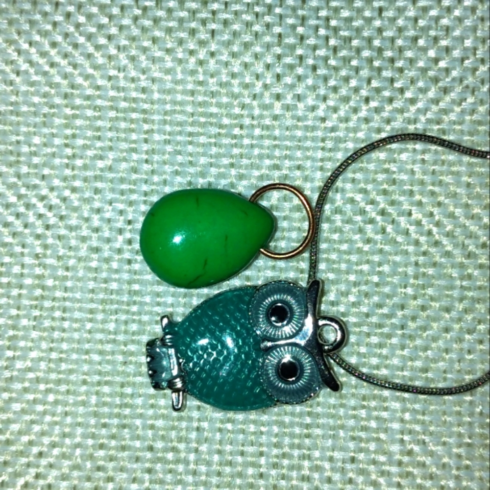 Pretty green moon necklace and blue owl.